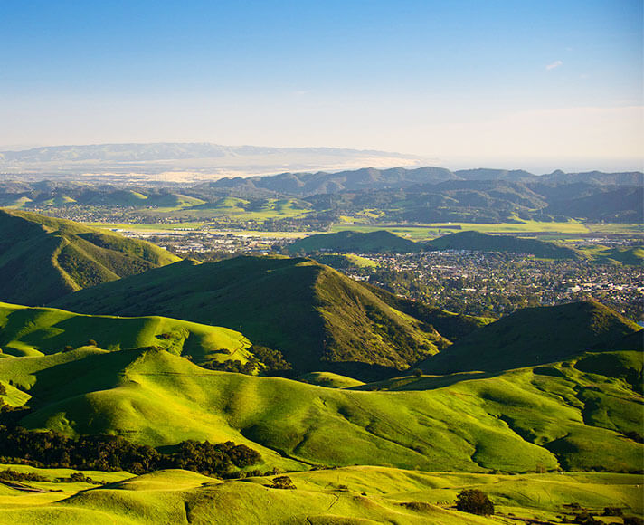 Rolling green hills over San Luis Obispo, California.