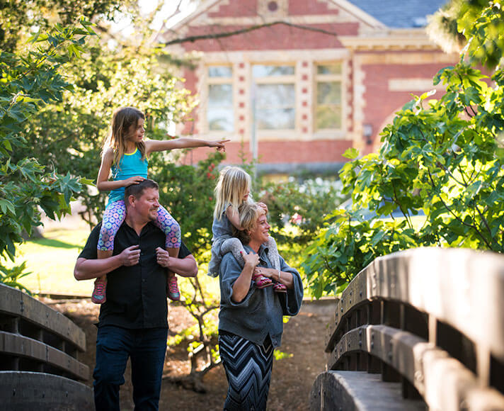 A family strolls through San Luis Obispo
