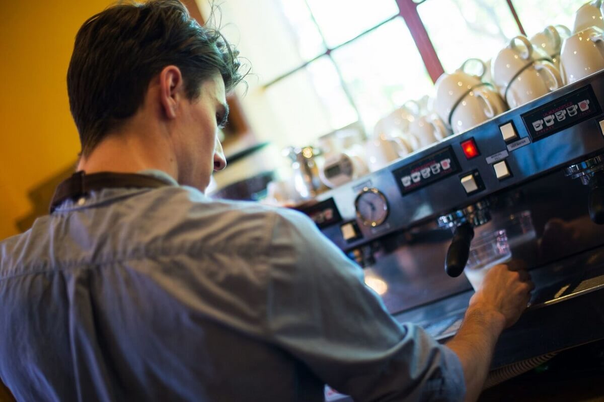 Barista brewing coffee in San Luis Obispo, CA