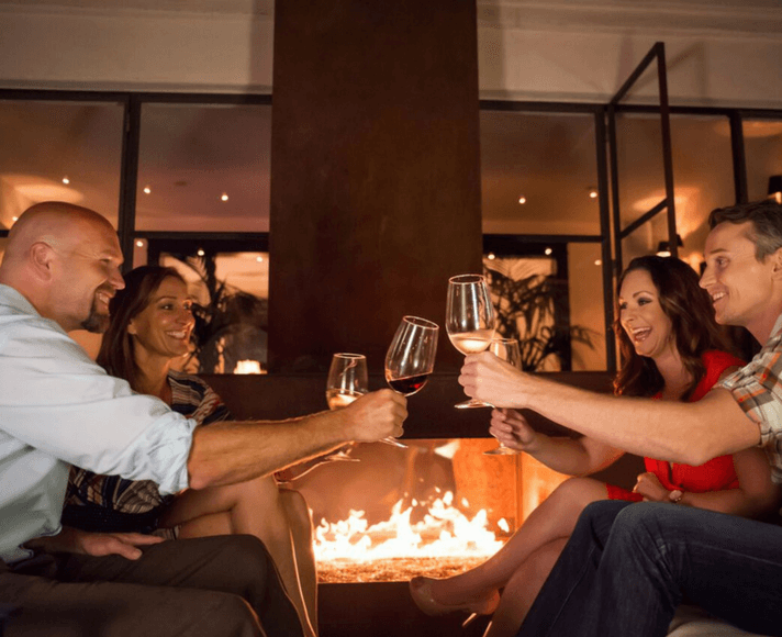 A group enjoying wine at Granada Hotel & Bistro in San Luis Obispo, CA