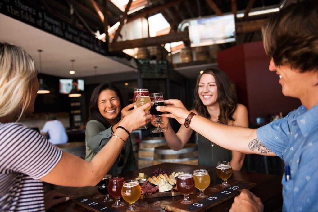 Group Cheering at Libertine Brewing Company