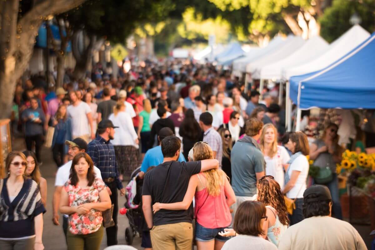 Couple Walking downtown at the Farmers' Market in SLO