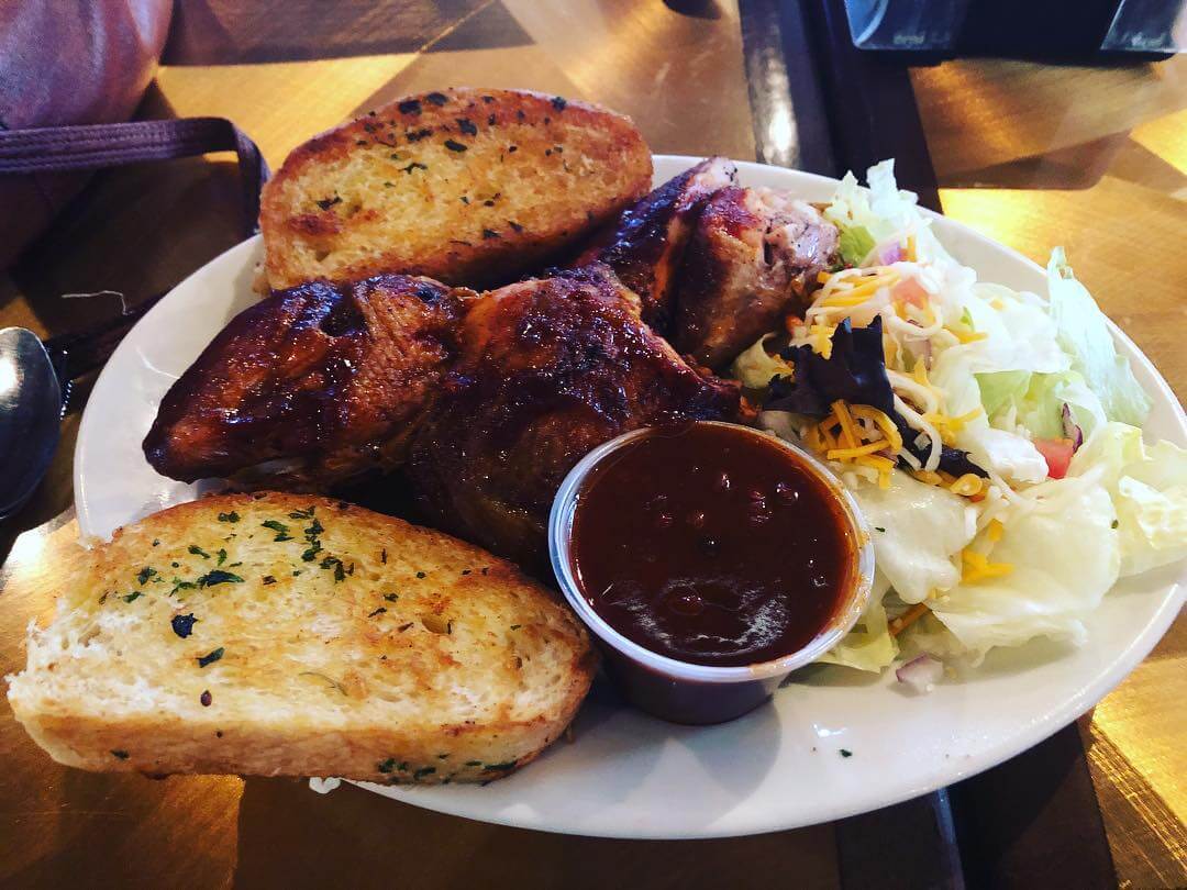 BBQ Chicken, garlic bread, and a side salad from G. Brothers Smokehouse in San Luis Obispo