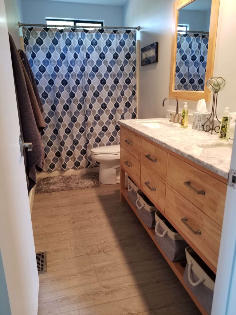 Bluerock Retreat Homestay Bathroom counter and shower in San Luis Obispo