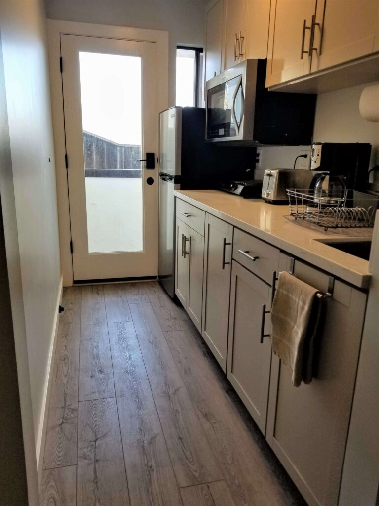 Bluerock Retreat Homestay Kitchen counter and glass door in San Luis Obispo
