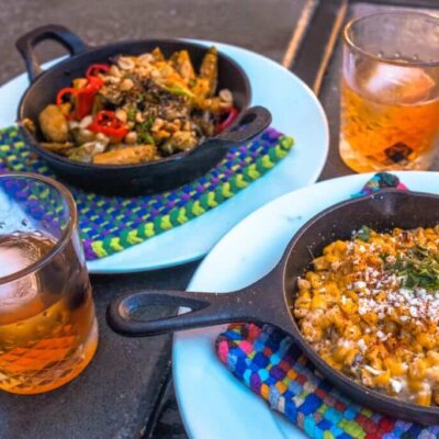 2 skillet plates and two cocktails in rocks glasses from 1865 Crafthouse in San Luis Obispo
