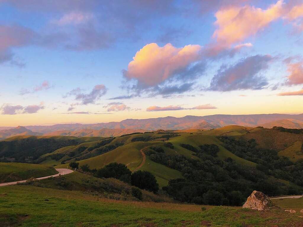 The rolling hills of Prefumo Canyon in San Luis Obispo with light clouds overhead. Photo by @beckyboersma_