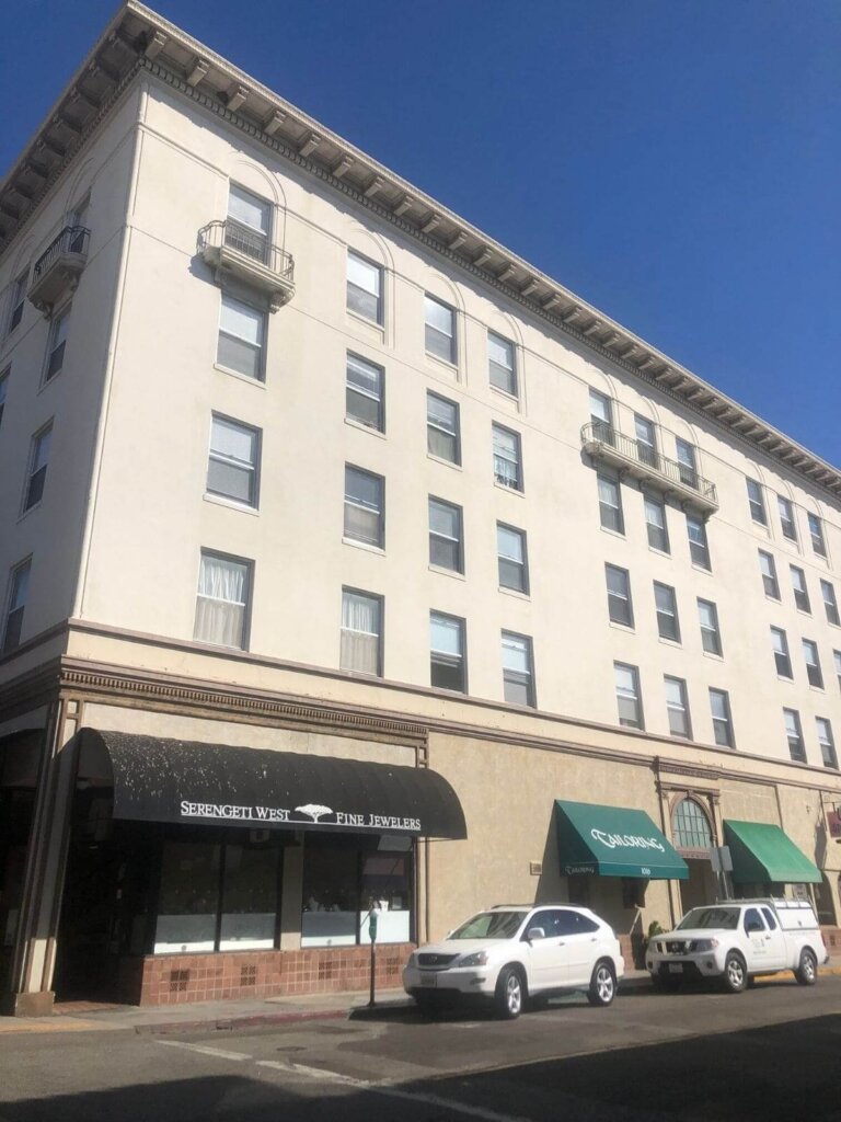 Looking up from across the street at the 5-story corner of the Anderson Hotel in Downtown San Luis Obispo, California.