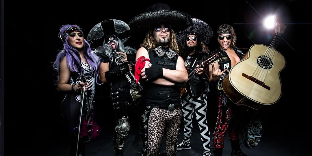 5 band members of Metalachi with sombreros and black clothing.