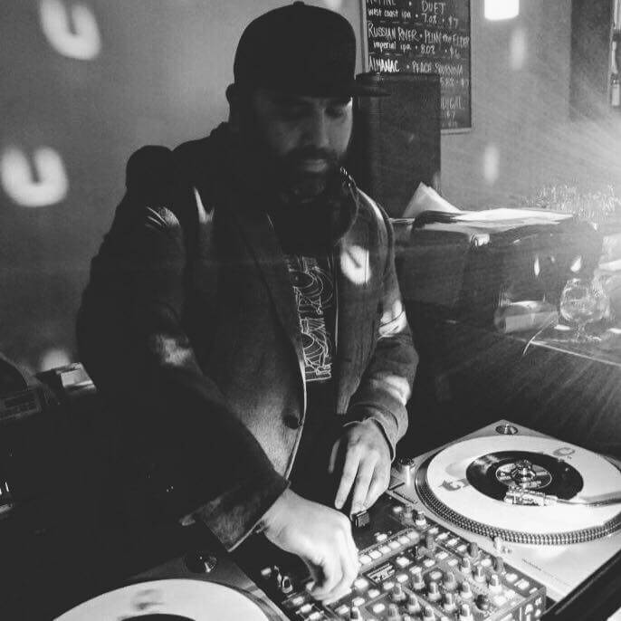 DJ Jason Perez on some turntables.