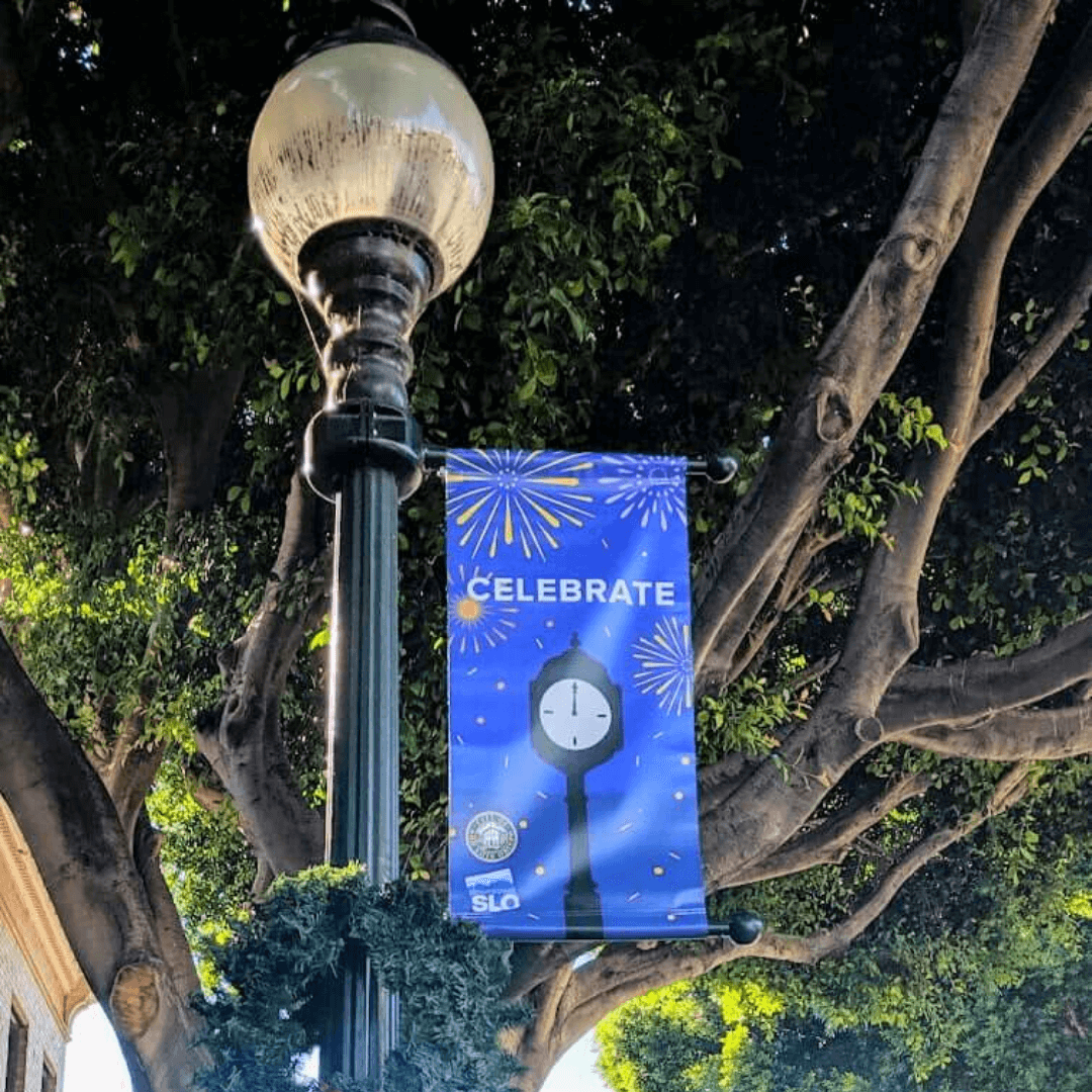 Holiday banners can be found around downtown SLO.