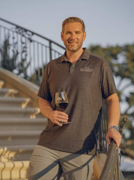 a man from the event's featured winemaker, Villa San Juliette