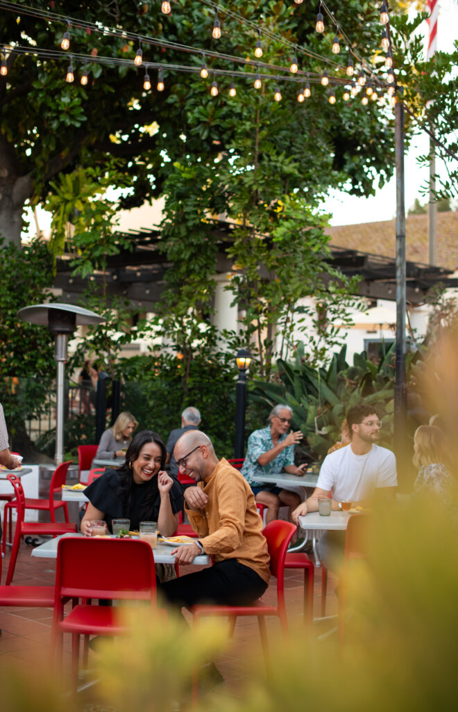 a couple enjoying dinner at one of San Luis Obispo’s many restaurants