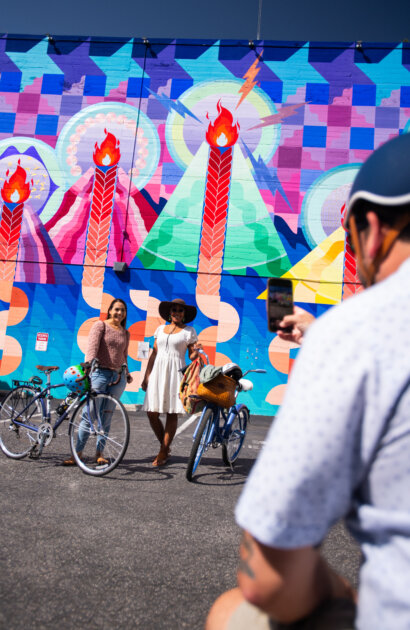 A group of cyclists riding through downtown SLO as part of the bike valet program.