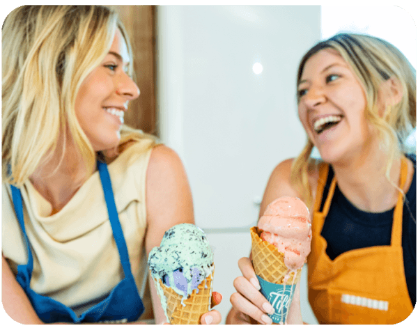 girls-smiling-holding-tifa-ice-cream